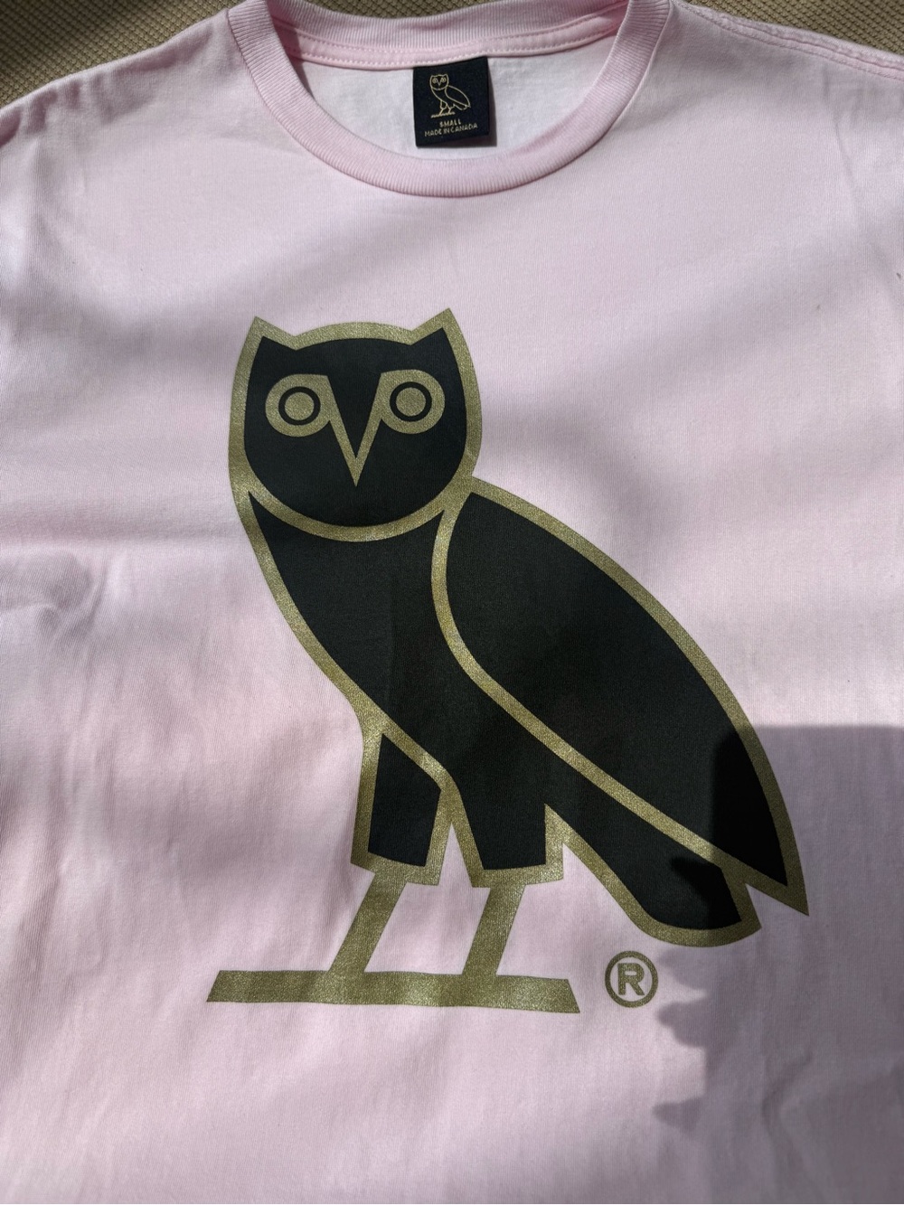 OVO Light Pink T-Shirt with Black and Gold Owl Logo